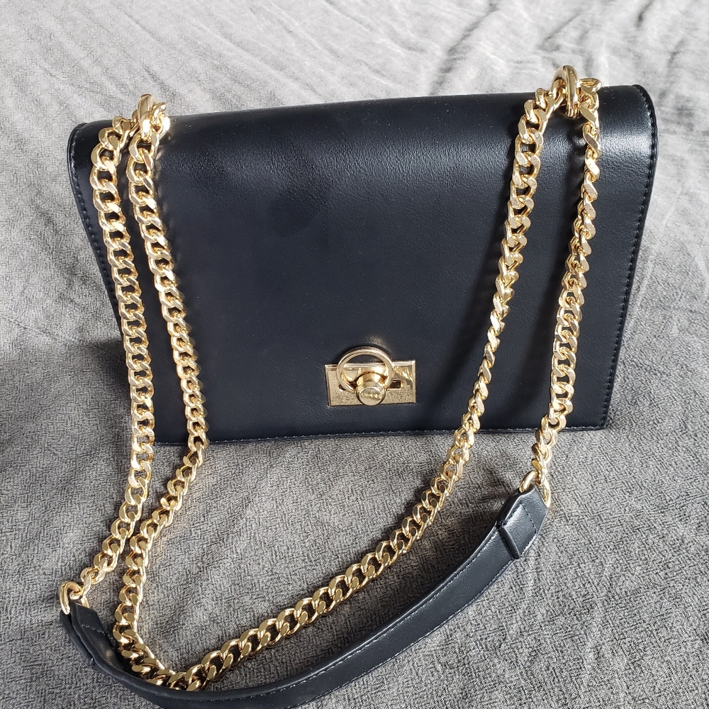 Black evening purse with gold strap